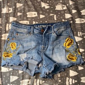 Flower embroidered jean shorts